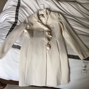 Never been worn ladies coat with tags.